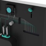 Internal view of lab device with tubing, and control modules.